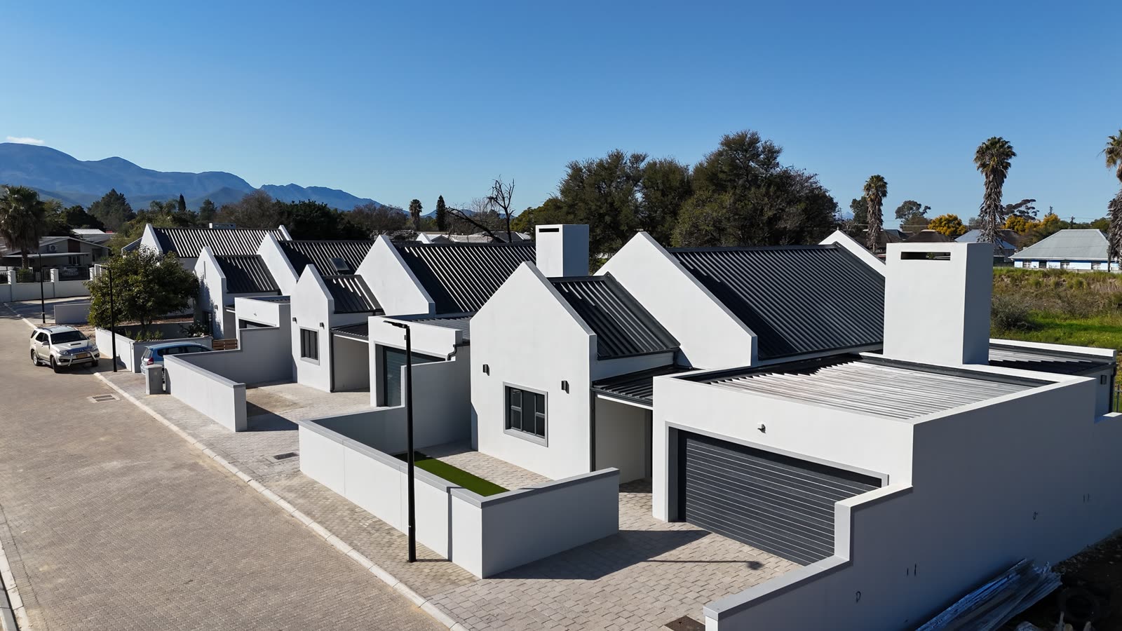 Row of freestanding homes along a village street